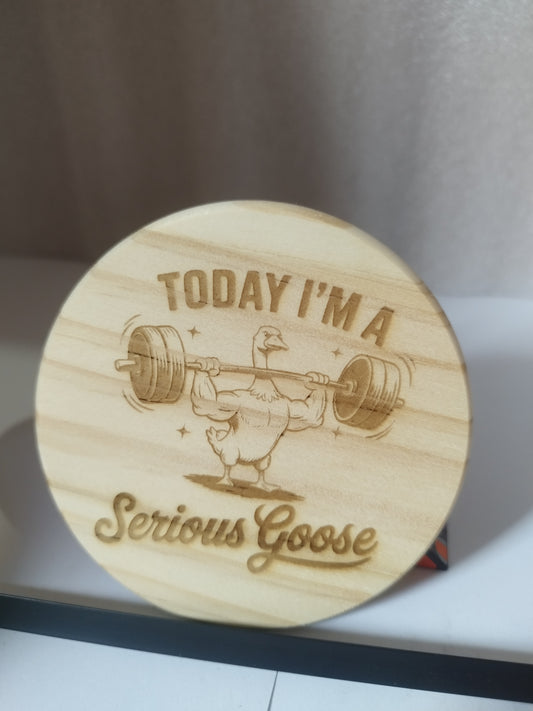 Serious goose engraved wood coaster