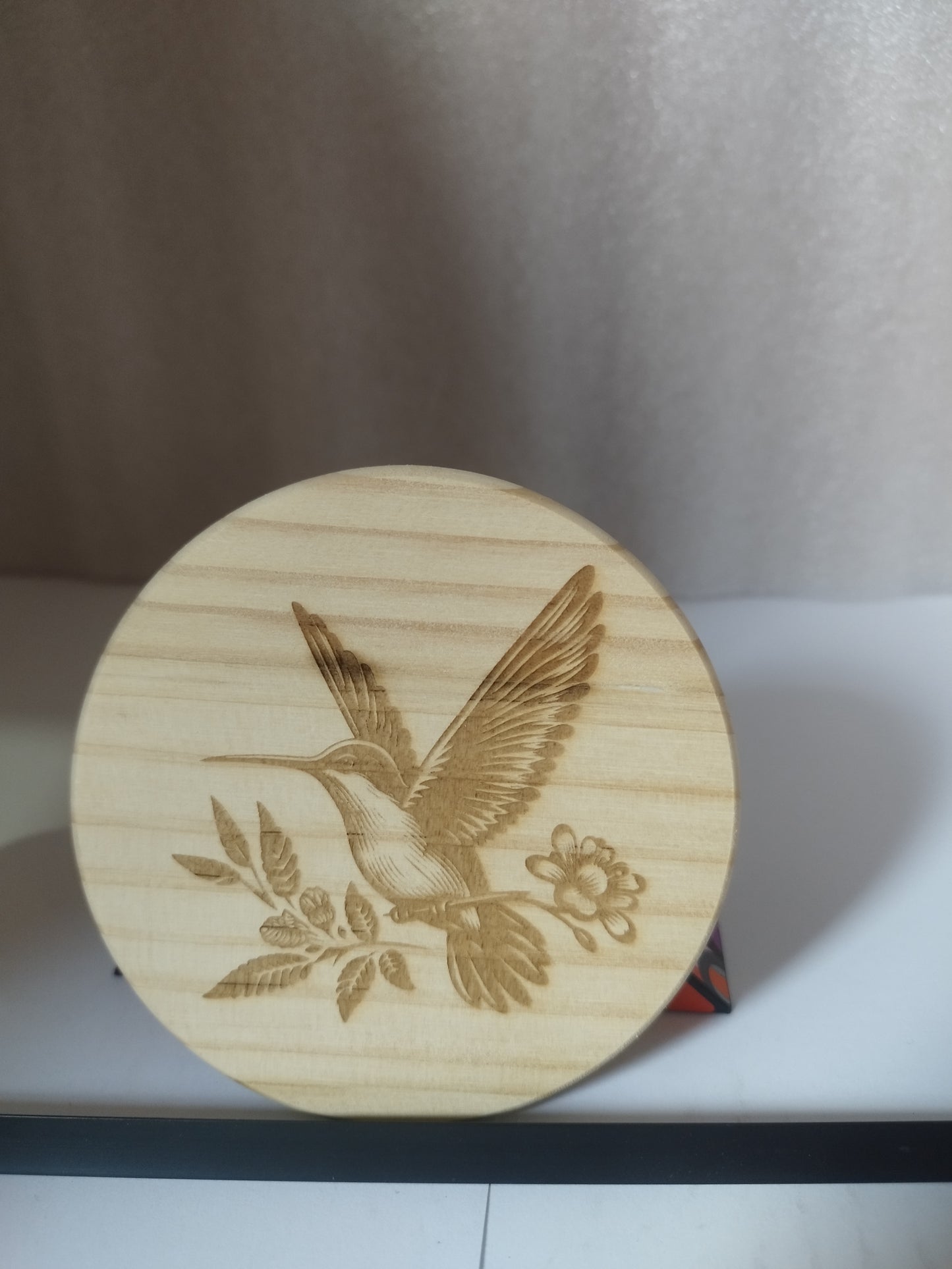 Bird engraved wood coaster