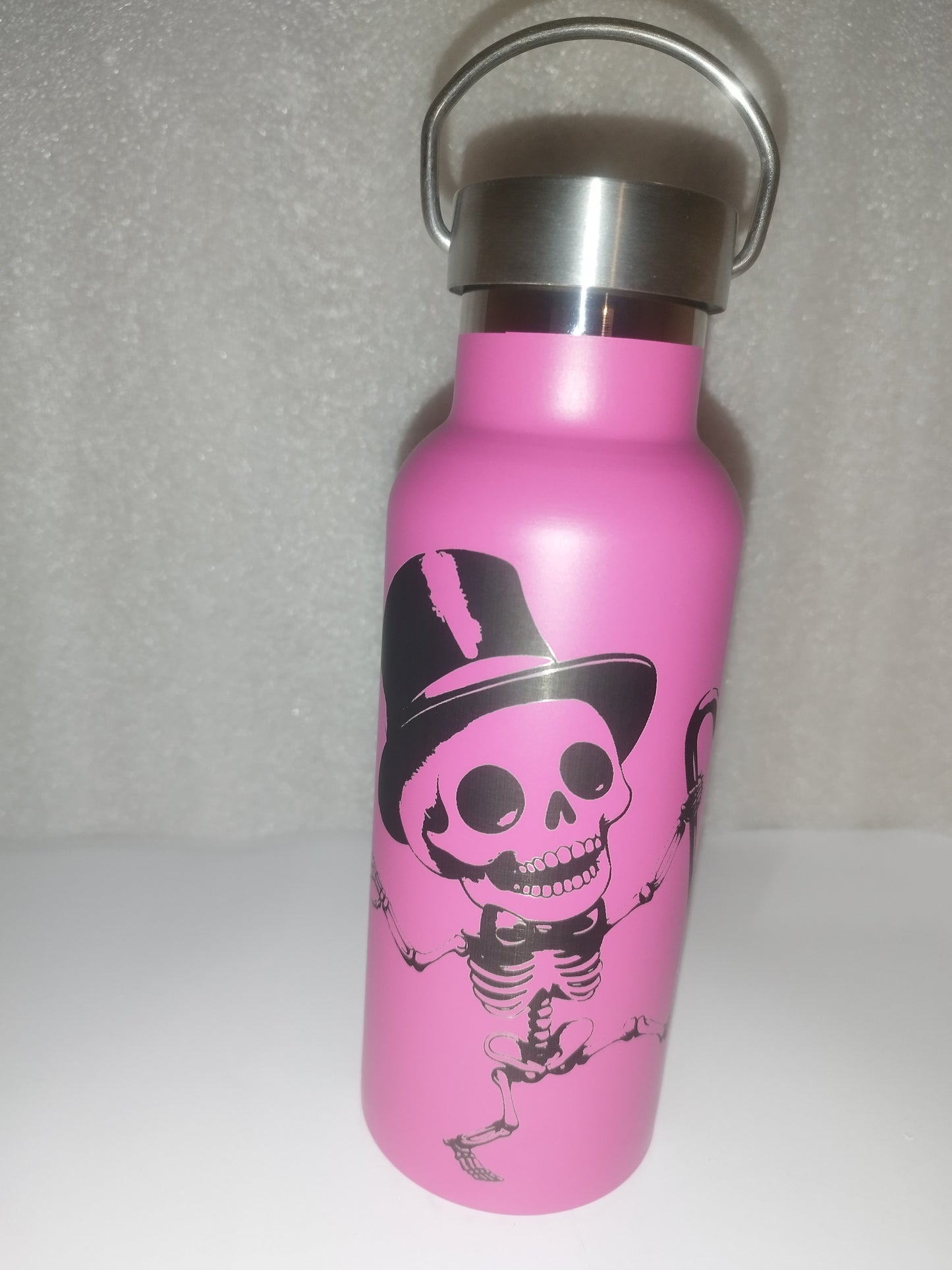 Skull engraved bottle