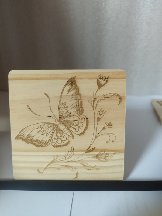 Butterfly engraved wood coaster