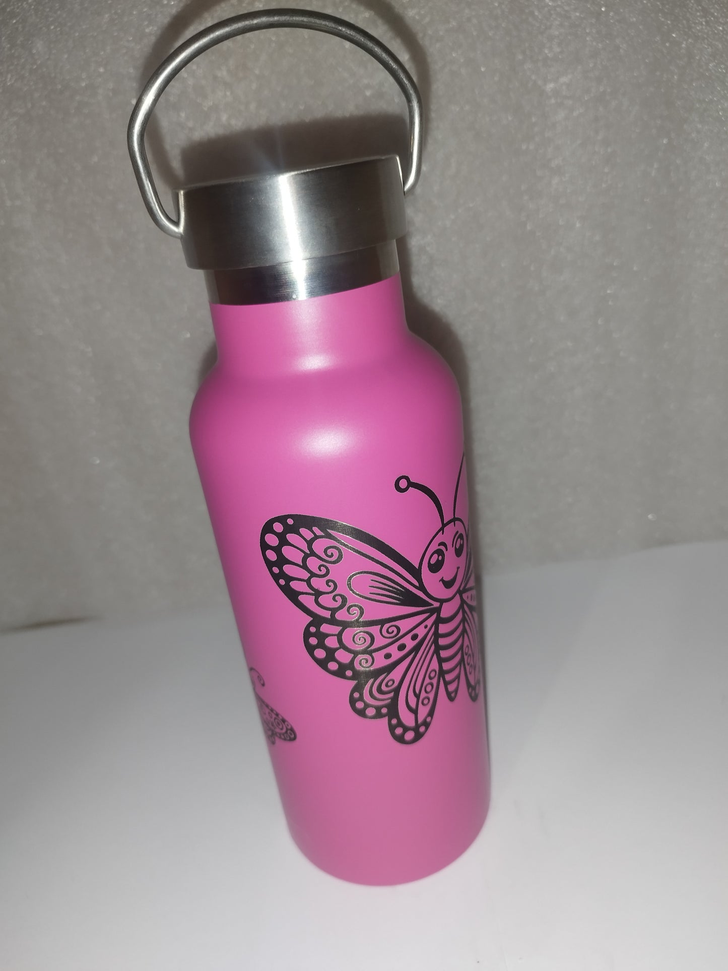 Butterfly engraved stainless steel bottle