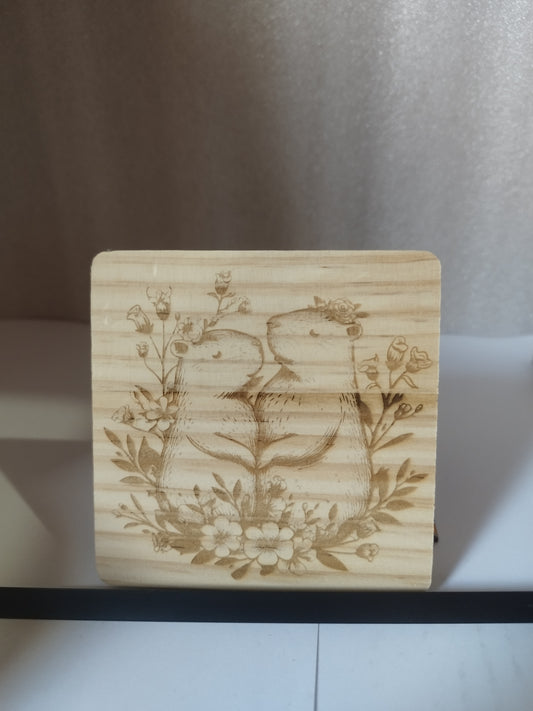 Pair flower engraved wood coaster