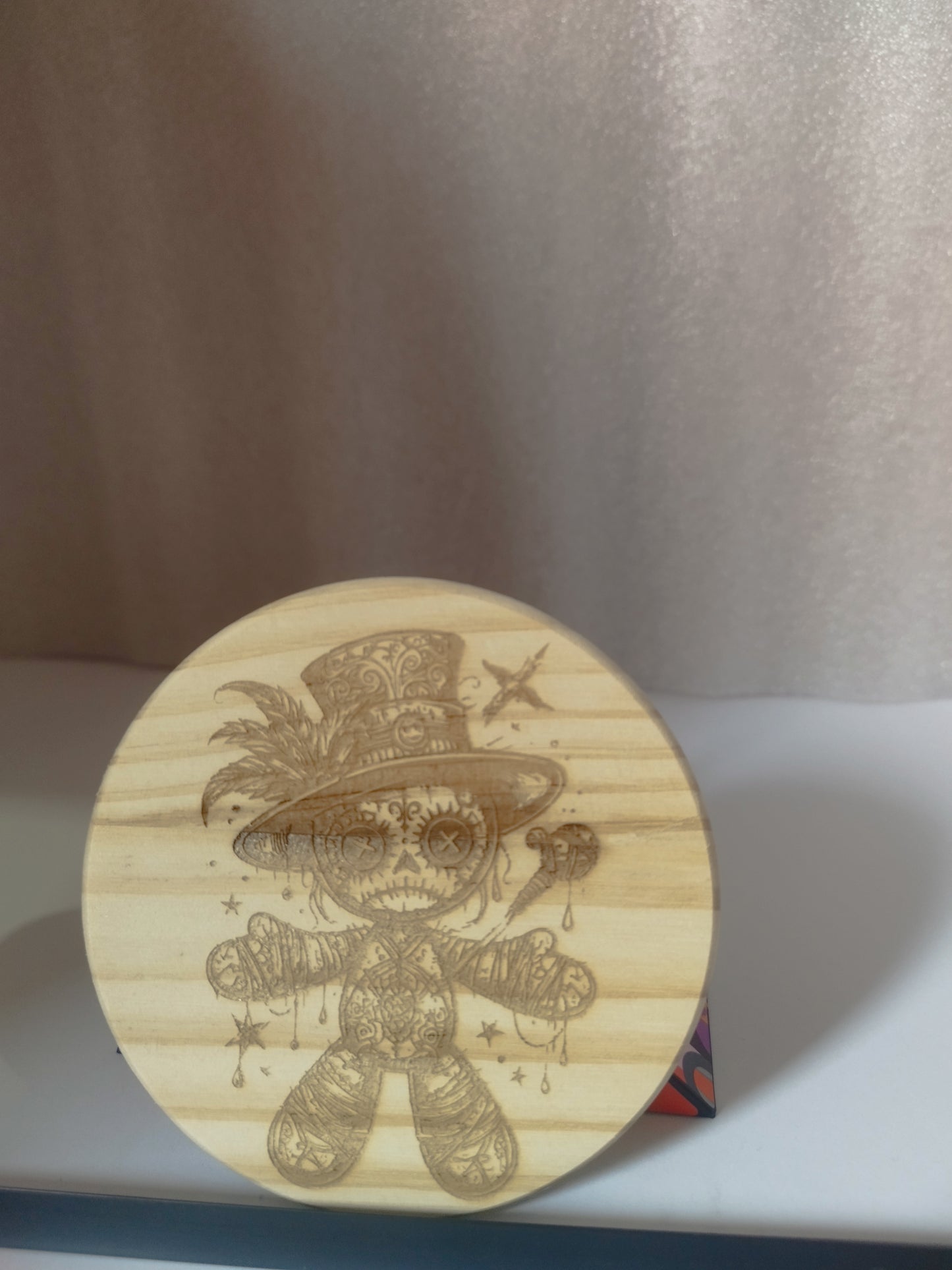 Voodoo engraved wood coaster