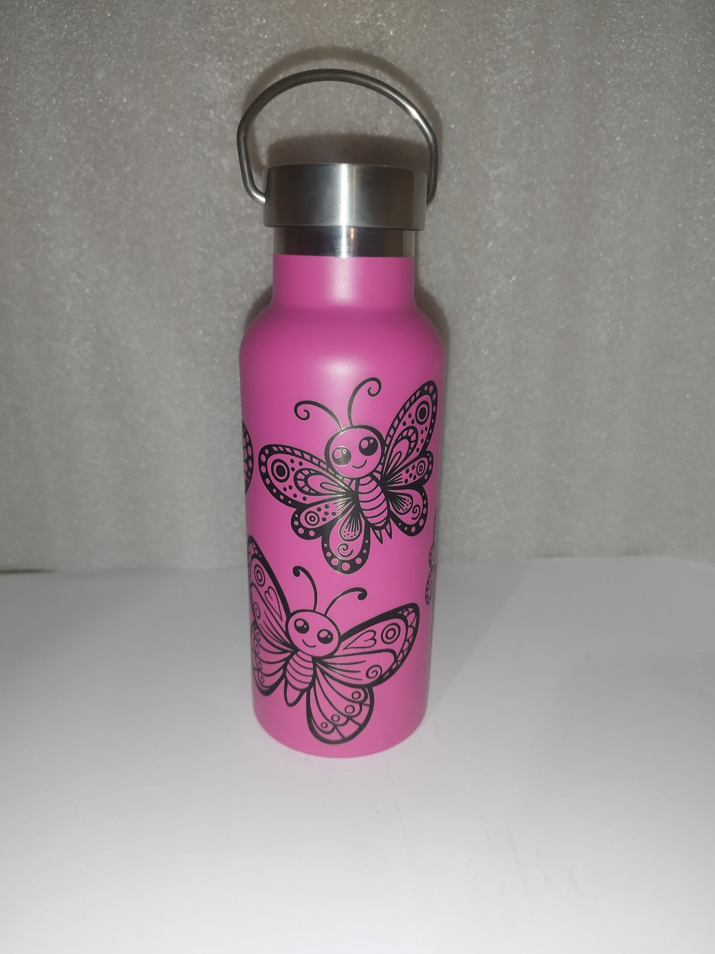 Butterfly engraved stainless steel bottle