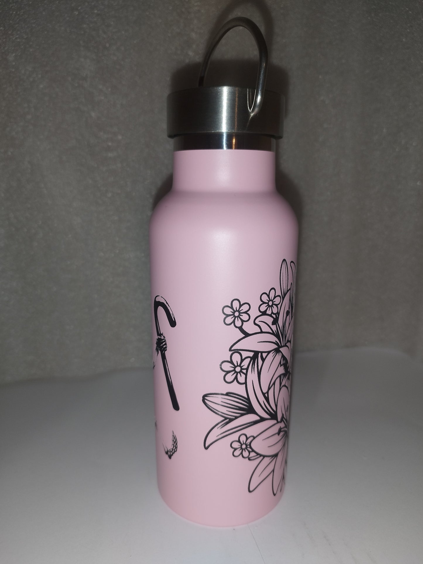 Pink skull engraved bottle