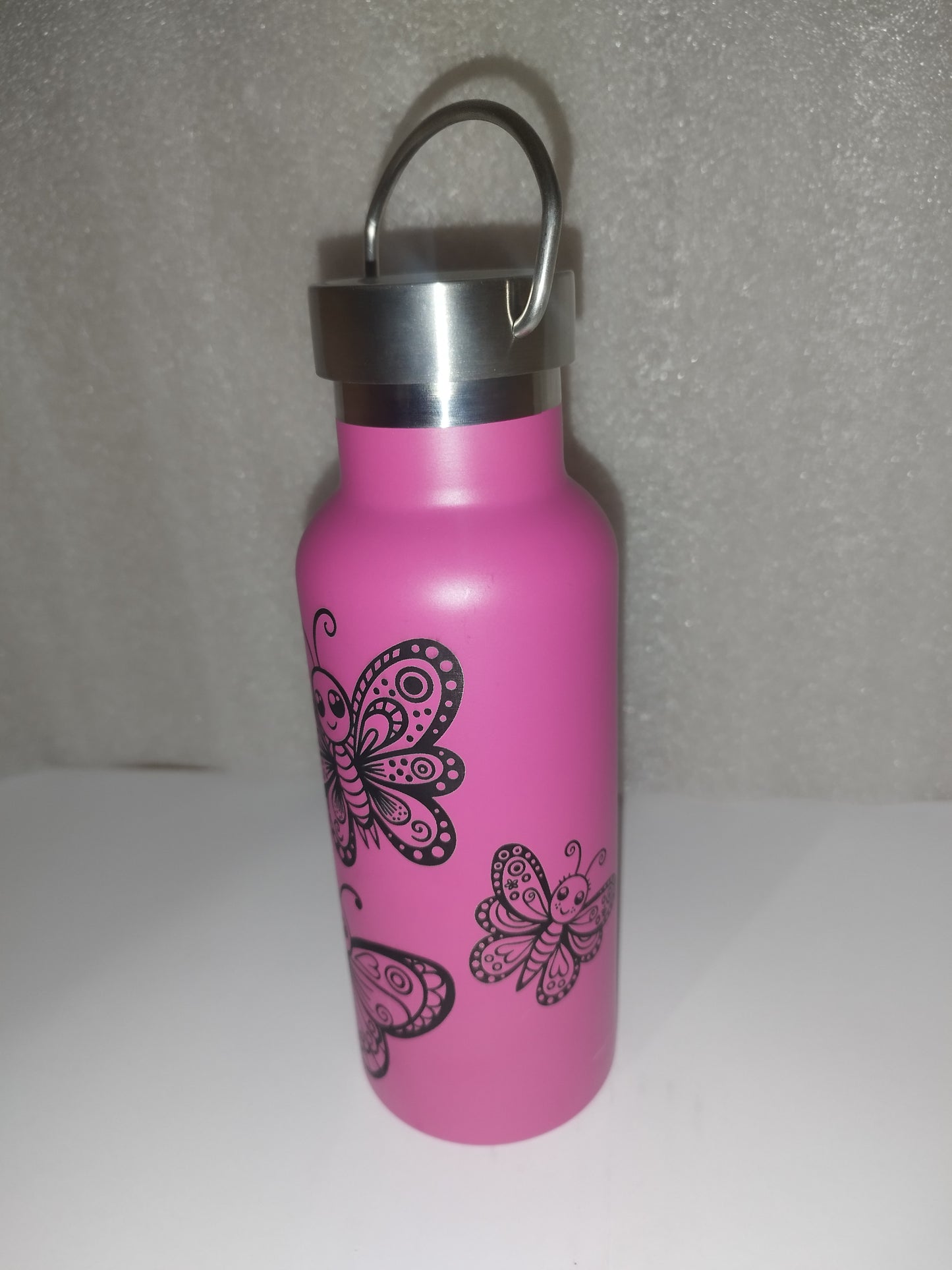 Butterfly engraved stainless steel bottle