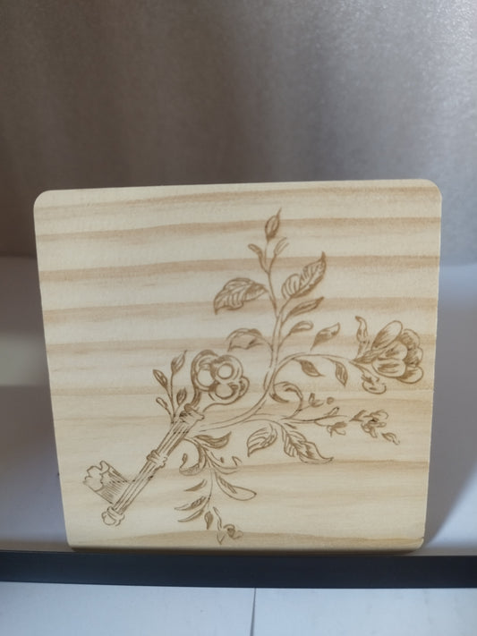 Key engraved wood coaster