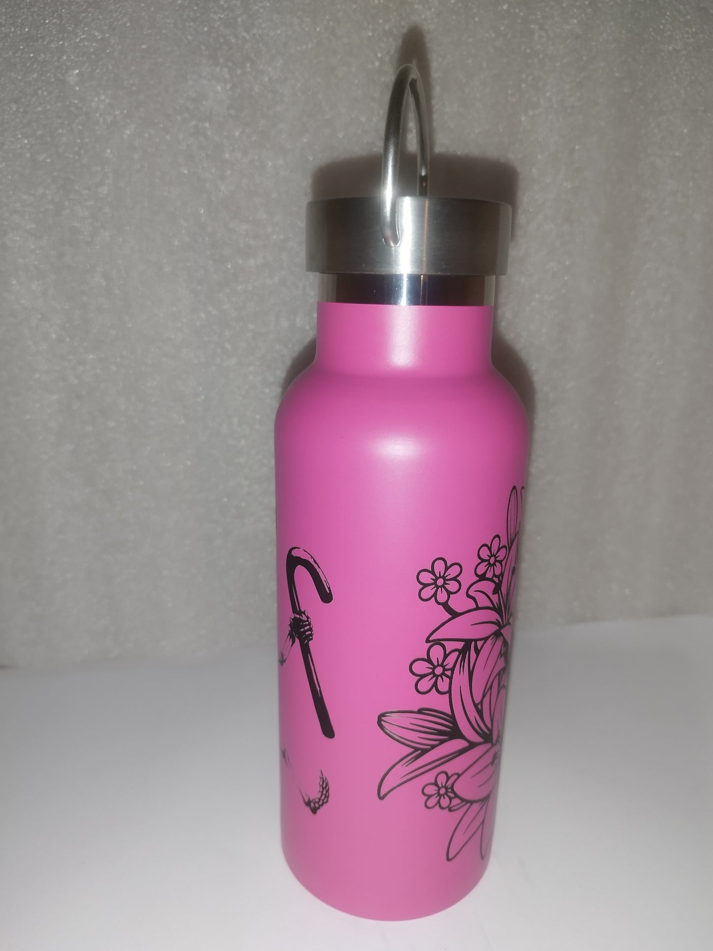 Skull engraved bottle