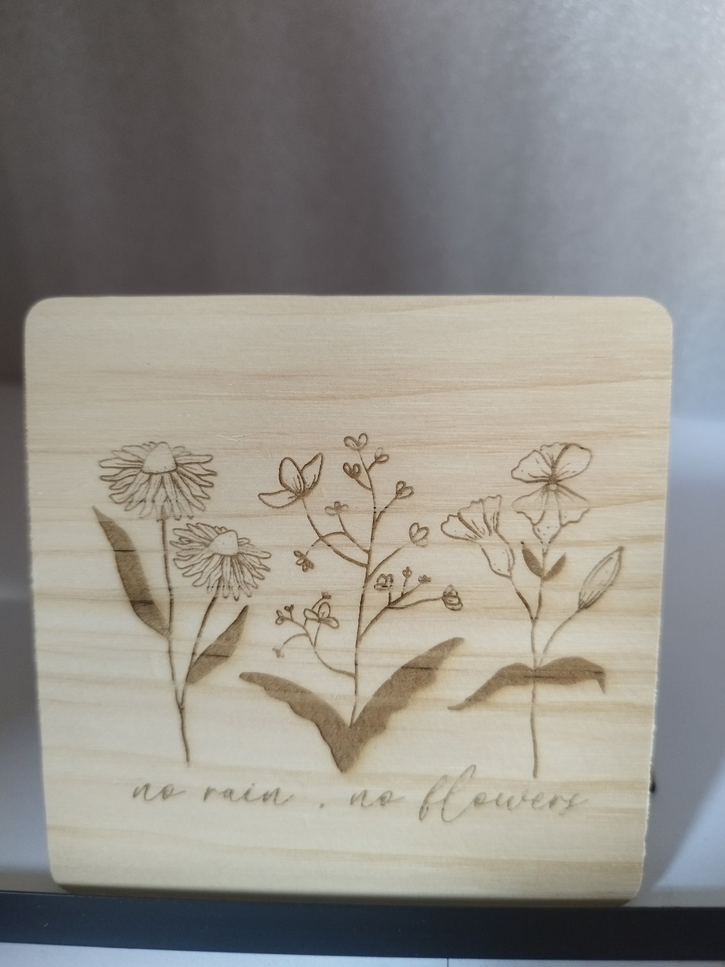 No rain engraved wood coaster