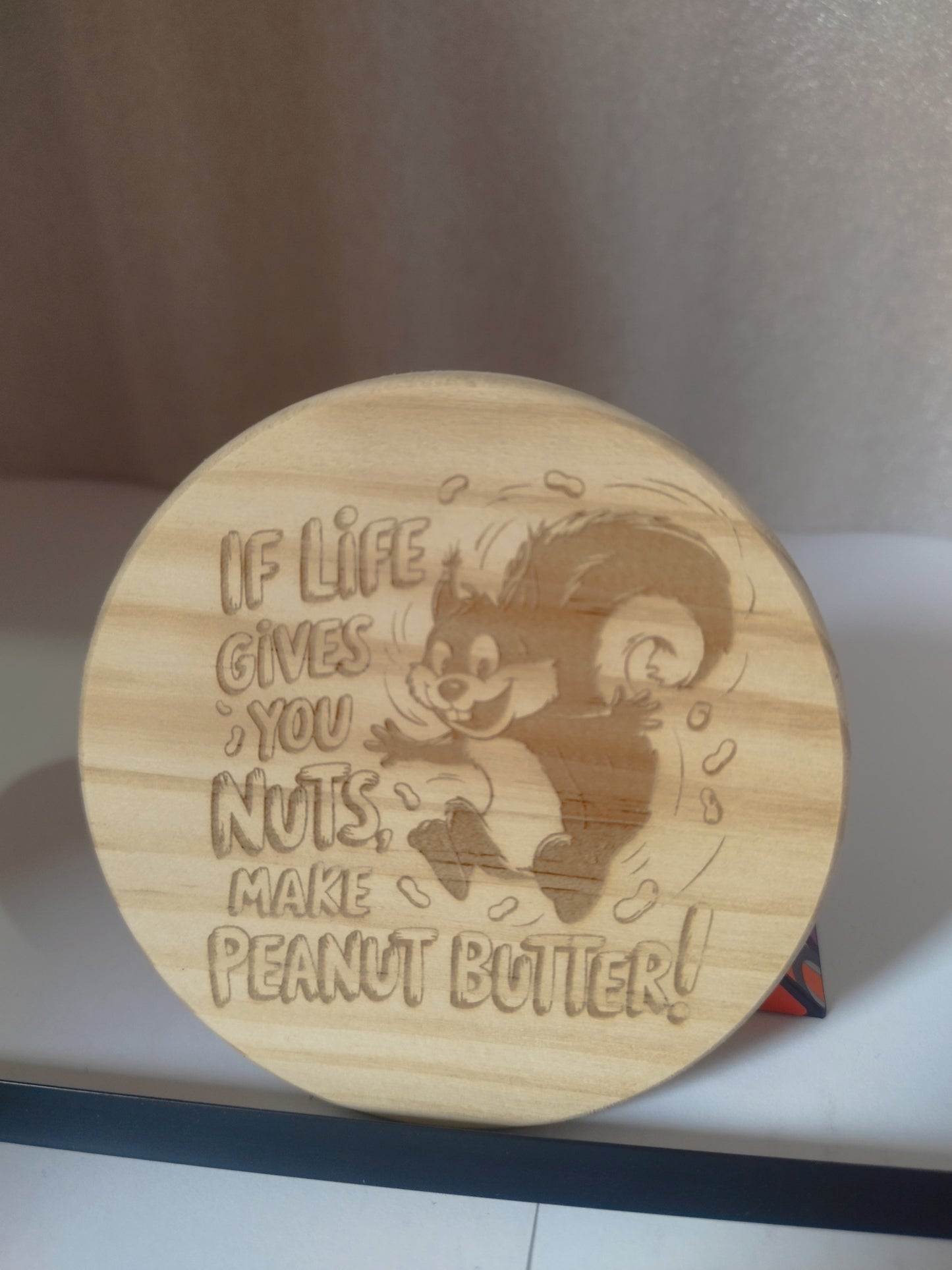 Nuts engraved wood coaster