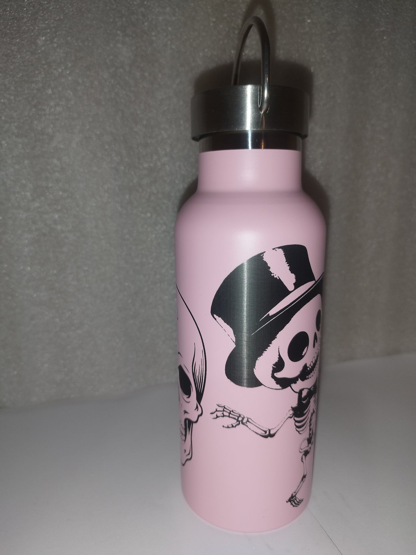 Pink skull engraved bottle