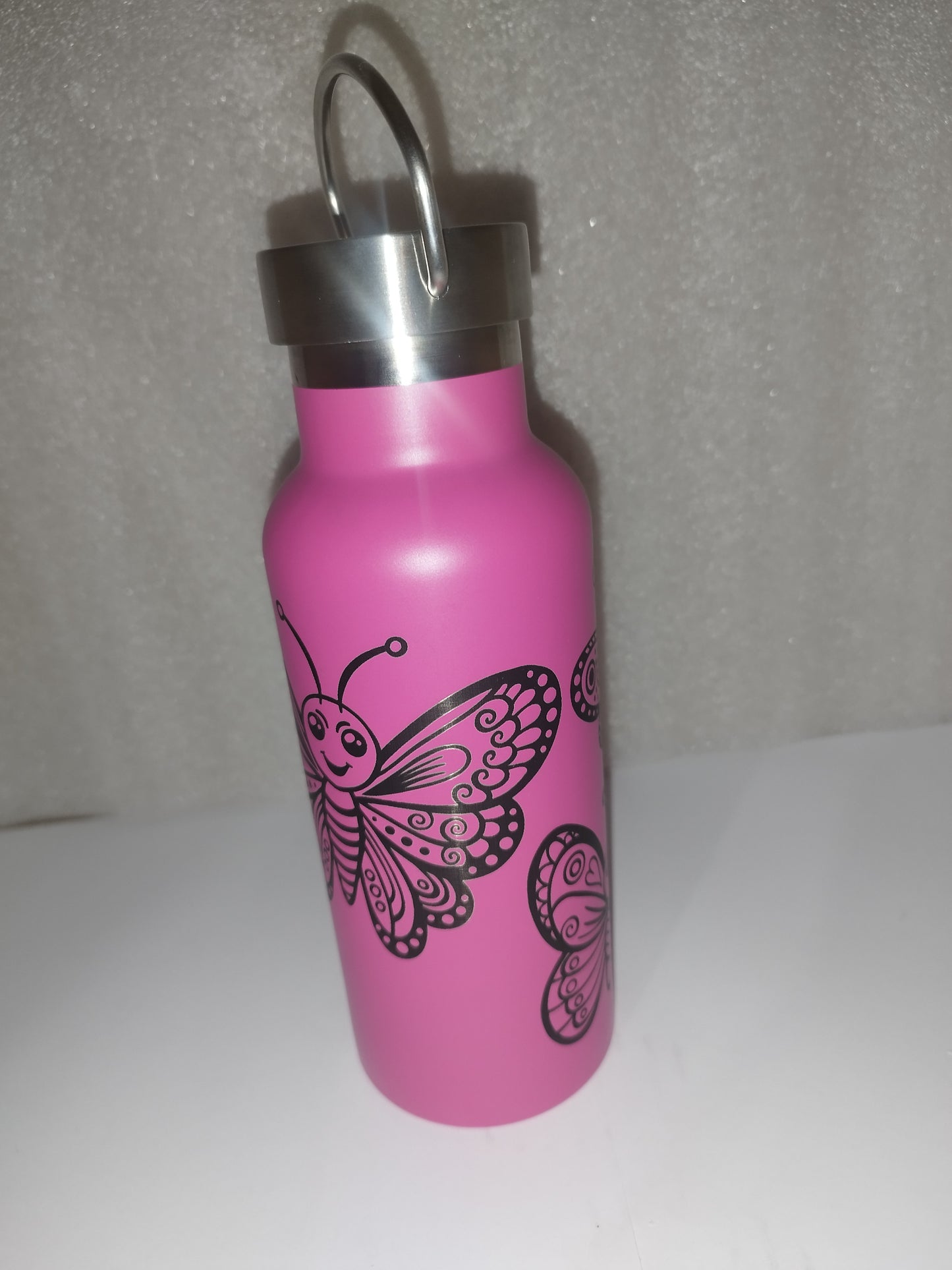 Butterfly engraved stainless steel bottle