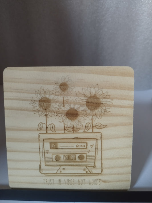Tape engraved wood coaster
