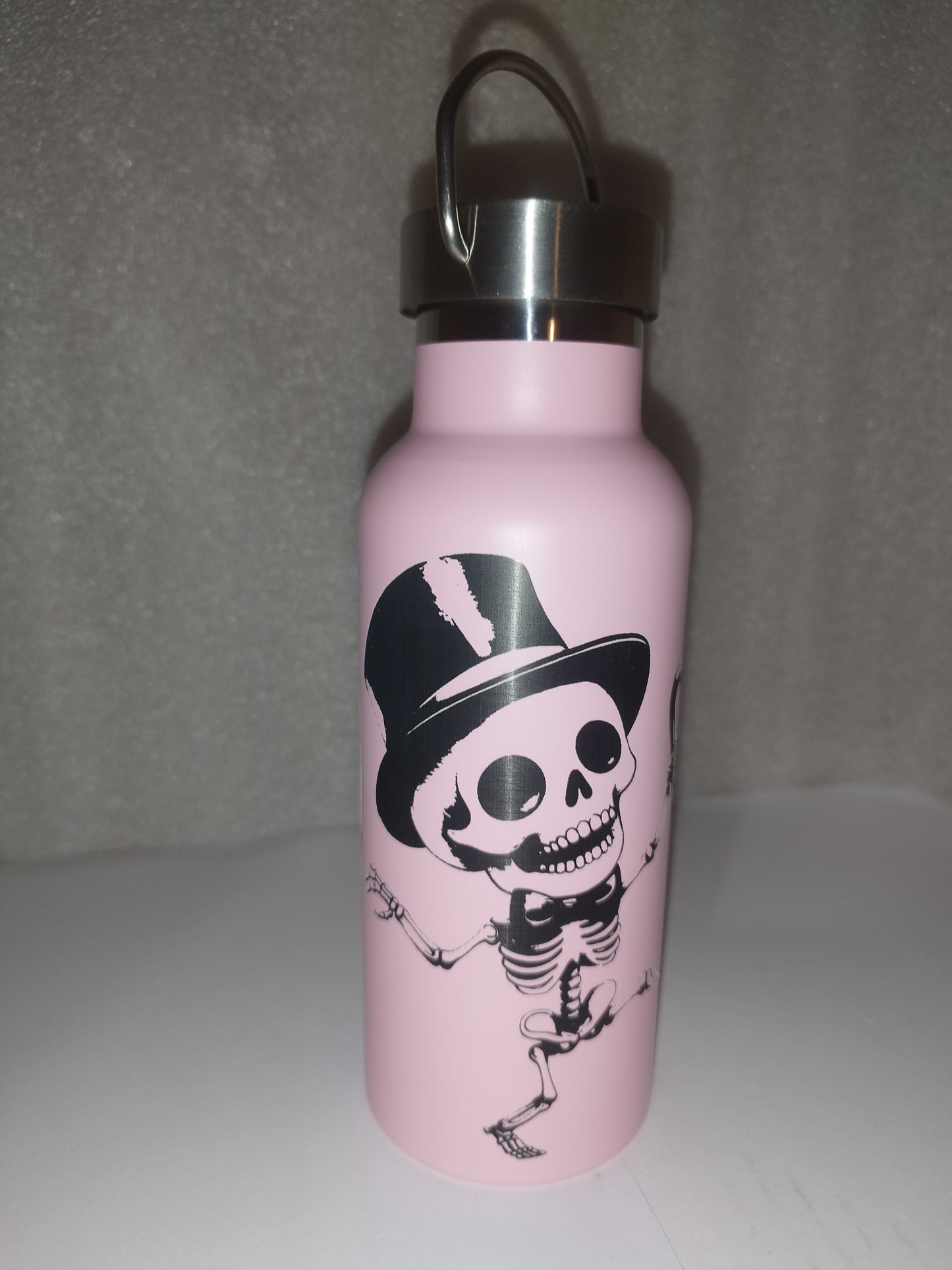 Pink skull engraved bottle